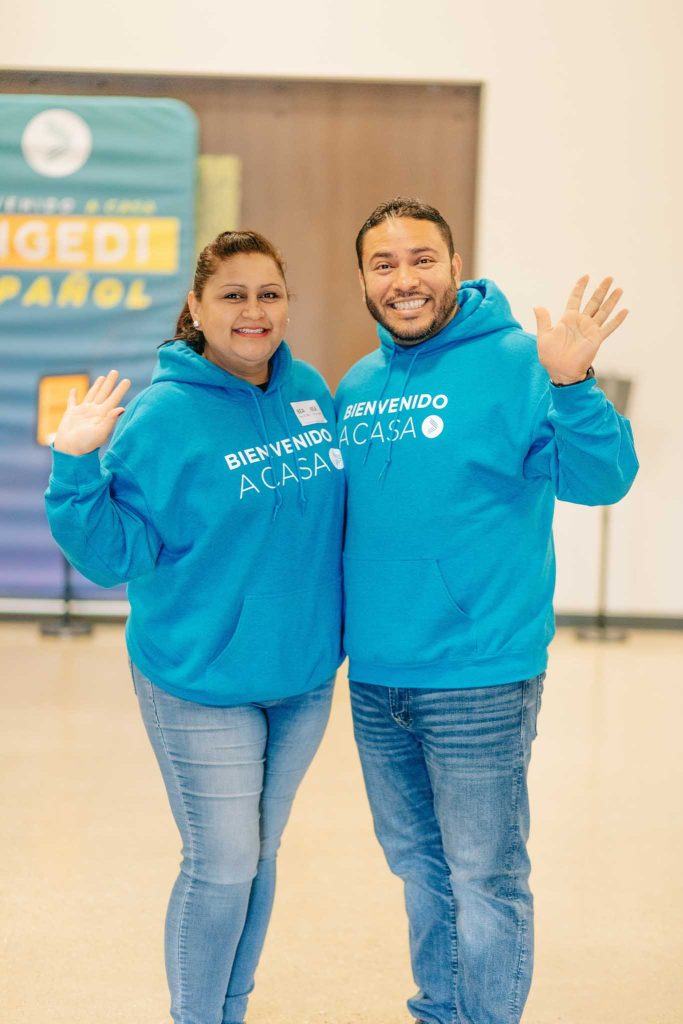 Guest experience volunteers welcome people at Engedi Español, a Spanish-speaking church location in Holland, Michigan.