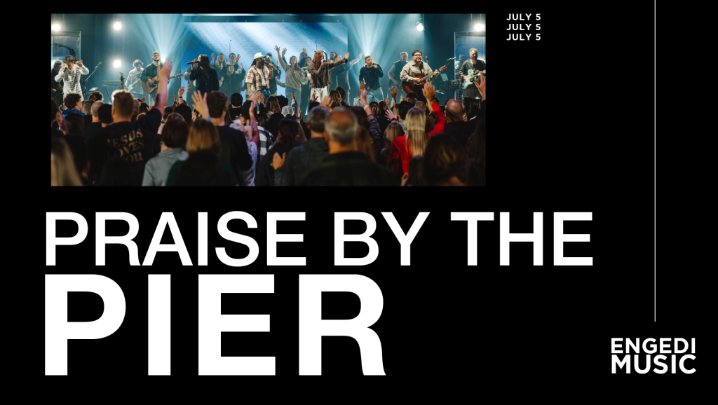 Crowd at a live concert with band on stage under blue lights; bold white poster text reads PRAISE BY THE PIER with Engedi Music logo in corner.