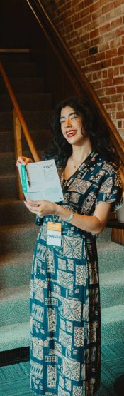 Woman on the guest experience team greeting people at Engedi Grand Rapids.